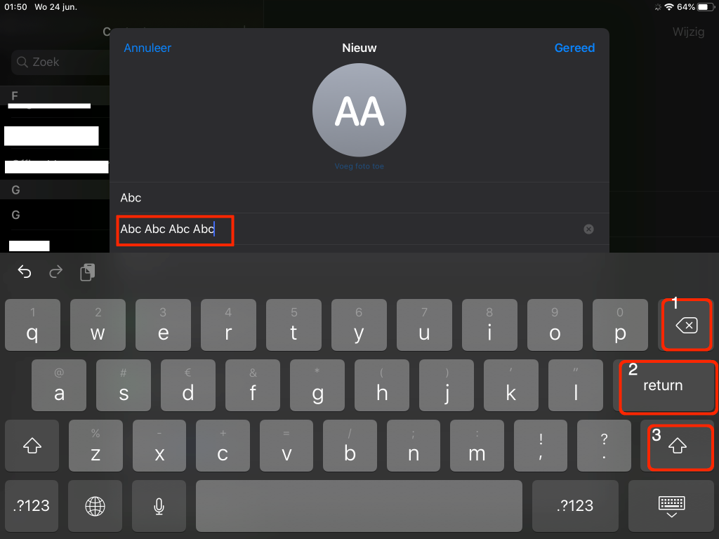 De Delete, Return, en Shift-toetsen op de iPad.